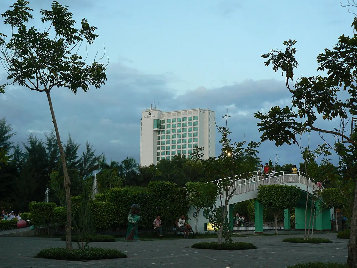 Colourful indigenous-inspired sculptures among the trees of People's Park in Davao City